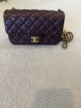 CHANEL Lambskin Quilted Mini Rectangular Flap Bag in Burgundy
